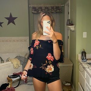 small floral off the shoulder shirt.